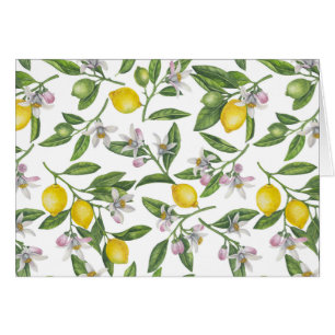Branches de citron avec fleurs et fruits sur blanc