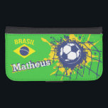 Brasil soccer football goal named flap case<br><div class="desc">Bright yellow,  blue and green (Brazilian colours) football / soccer ball splatting in the back of the goal / net with brasil flag cell phone case. Ideal for Brazilian football or soccer fans,  personalize with your own name currently reads Matheus. Designed by Sarah Trett.</div>