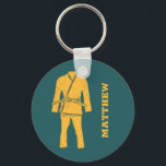 Brazilian Jiu Jitsu BJJ Gi Teal Personalized Keychain<br><div class="desc">Create a personalized gift that's perfect for Brazilian Jiu Jitsu or BJJ students and instructors. This keychain features an illustration of a BJJ gi or uniform in golden yellow against a teal coloured background. It's ready to be personalized with a name in matching yellow lettering beside the graphic.</div>