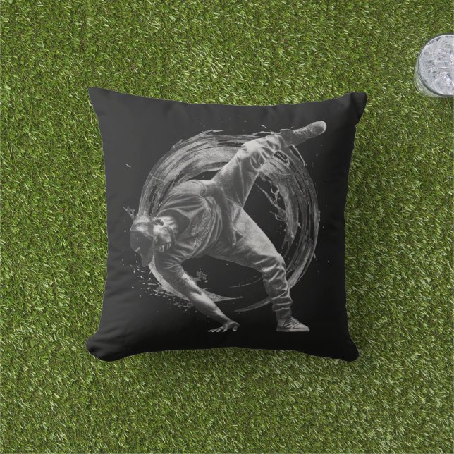Breakdancer in action, in ink splatter style outdoor pillow (Grass)