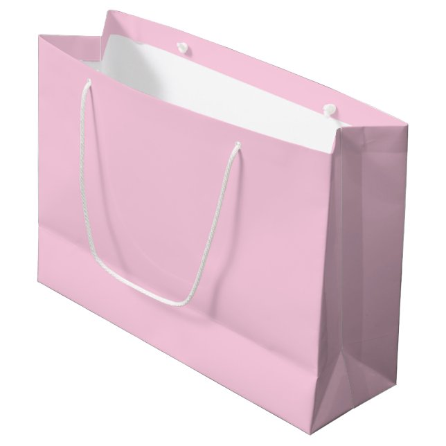 Breast cancer awareness light pink solid colour large gift bag (Front Angled)