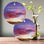 Breathtaking sunset over the sea, personalizable  ceramic ornament<br><div class="desc">This Ceramic Ornament features an amazing sunset by the sea. Wonderful cloudy evening sky in lavender,  pink,  yellow. Beautiful quote "A beautiful life is a collection of unforgettable moments". Beautiful gift idea for any woman!  Also a wonderful mother's day gift. Personalizable! Originalphoto by Marions Artwork.</div>