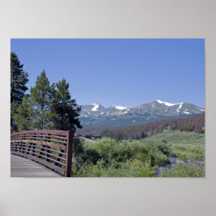 Breckenridge Bike Bridge and Snow Capped Mountains Poster