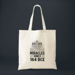 Brewing Miracles Since 164 BCE Hanukkah Jewish Tote Bag<br><div class="desc">Hanukkah Miracle Meme, Jewish History Humour, Menorah Oil Miracle, Festival Of Lights Quote, Hanukkah 2025 Tradition, Brewing Miracles, Ancient Jewish Humour, Cultural Heritage, Holiday History, Miracle Of Light</div>
