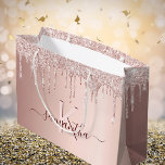 Bridal Shower rose gold glitter pink monogram Large Gift Bag<br><div class="desc">A gift bag for a girly and glamourous Bridal Shower, bachelorette party. A faux rose gold background with elegant pink and rose gold glitter drips, paint dripping look. Personalize and add a name and monogram letter. The name is written in burgundy with a modern hand lettered style script with swashes....</div>