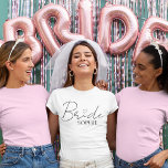 Bride Personalized Bachelorette | Custom Name T-Shirt<br><div class="desc">Make the bride-to-be shine with this chic and personalized "Bride" T-shirt, featuring elegant script with a sweet heart detail and her name underneath. Perfect for bachelorette parties, bridal showers, wedding weekends, or as a fun getting-ready outfit. Comfortable, stylish, and totally Insta-worthy, this custom tee is a must-have for any modern...</div>