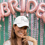 Bride Personalized Bachelorette Party Cap<br><div class="desc">Celebrate the bride-to-be with this chic and fun personalized trucker hat — the perfect accessory for bachelorette parties, beach getaways, and wedding prep! Featuring a modern script "Bride" with heart detail and a customizable name, this lightweight and breathable cap keeps her stylish and sun-safe. Available in a variety of colours...</div>