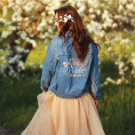 Bride Script Chic Watercolor Wildflower Wedding Denim Jacket<br><div class="desc">Love blooms in the most unexpected ways! Our Bride script wildflower wedding denim jacket features our hand-painted wildflower floral arrangement. Designed to make heads turn on your special day. Whether you're a trendsetter bride or looking for the perfect gift for a sunflower enthusiast bride-to-be, this jacket is a must-have addition...</div>