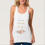 Bride to be rose gold floral eucalyptus greenery tank top<br><div class="desc">For a bridal shower or a bachelorette spa and wellness weekend. A chic white background. Decorated with a rose gold, blush pink floral, flower (rose)and green watercolored eucalyptus leaves, sprigs, greenery and a faux gold sprig. Personalize and add the name of the bride. Black and golden letters. With the text:...</div>