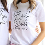 Bride Tribe Black Modern Script Custom Wedding T-Shirt<br><div class="desc">Modern and casual chic black calligraphy script "Bride Tribe" women's wedding tee shirt features custom text that can be personalized for your bridal party crew. Perfect for your bridesmaids to wear at the bachelorette party and the wedding weekend!</div>