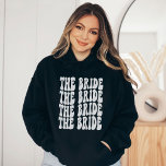 Bride White Customized Matching Bridal Party Hoodie<br><div class="desc">Are you looking for a unique and personalized bachelorette party outfit? Look no further than the white text Bride hoodie. This sweatshirt is perfect for your group of girlfriends. It features a fun and colourful design that will match any theme you choose for your bachelorette party. Plus, it's made from...</div>