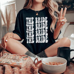Bride White Customized Matching Bridal Party T-Shirt<br><div class="desc">Are you looking for a unique and fun way to celebrate your bachelorette party? Why not go with a personalized t-shirt theme? With our retro The Bride personalized white lettering t-shirt, you can have all of your bridal party matched up in style! Not only will this shirt be a great...</div>