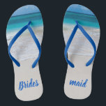 Bridesmaid Beach Wedding Flip Flops<br><div class="desc">Bridesmaid's flip flops with a photo of a white sandy beach and turquoise ocean water. Brides maid done in blue text is fully customizable to suit your needs.</div>