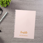 Bridesmaid blush pink notebook<br><div class="desc">A blush pink background colour. Personalize and add your bridesmaid's name. Golden handwritten style script.</div>