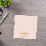 Bridesmaid blush pink notebook<br><div class="desc">A blush pink background colour.  Personalize and add your bridesmaid's name.  Golden handwritten style script.</div>