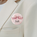 Bridesmaid bow pink name tag 1 inch round button<br><div class="desc">A soft blush pink coloured background. Decorated with a large bow.  Personalize and add your bridesmaid's name.   Black handwritten style script.</div>
