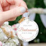 Bridesmaid Coral & Silver Lace White Wedding Gift Keychain<br><div class="desc">These keychains are designed to give as favours to bridesmaids in your wedding party. They feature a simple yet elegant design with a white background, terracotta or coral orange and grey text, and a silver faux foil floral lace border. There is space for her name, the names of the couple,...</div>