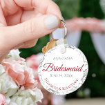 Bridesmaid Elegant Wedding Gift Red & White Keychain<br><div class="desc">These keychains are designed to give as favours to bridesmaids in your wedding party. They feature a simple yet elegant design with a white background, crimson red & Grey text, and a silver faux foil floral border. Perfect way to thank your bridesmaids for being a part of your special day!...</div>