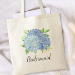 Bridesmaid Floral Blue Hydrangea Foliage Tote Bag<br><div class="desc">This bridesmaid tote bag features a watercolor blue hydrangea and green foliage design. You can personalize it with a name. Please visit our store or our collection pages for more products featuring this design that you can customize for your needs.</div>