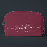 Bridesmaid Gift Burgundy Dopp Kit<br><div class="desc">This Bridesmaid accessory bag features a handwritten white script typography with swashes on a caramel background. Present your bridesmaids with a toiletry bag for their makeup and small items traditionally presented at the rehearsal dinner,  for use in the early morning before the wedding.</div>