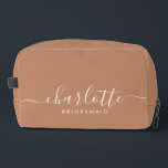 Bridesmaid Gift Caramel Dopp Kit<br><div class="desc">This Bridesmaid accessory bag features a handwritten white script typography with swashes on a caramel background. Present your bridesmaids with a toiletry bag for their makeup and small items traditionally presented at the rehearsal dinner,  for use in the early morning before the wedding.</div>