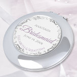 Bridesmaid Gift Lavender Purple Silver Compact Mirror<br><div class="desc">These compact mirrors are designed to give as favours to the bridesmaids in your wedding party. Designed to coordinate with our Purple & Grey Elegant Wedding Suite, they feature a simple yet elegant design with a white background, Purple & Grey, and a silver faux foil floral border. Perfect way to...</div>