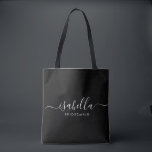 Bridesmaid Gift Personalized Black Tote Bag<br><div class="desc">This Bridesmaid accessory bag features a handwritten white script typography with swashes on a black background. Present your bridesmaids with a tote bag for small items traditionally presented at the rehearsal dinner,  for use in the early morning before the wedding.</div>