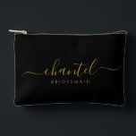 Bridesmaid Modern Gold Script Black Accessory Pouch<br><div class="desc">This Bridesmaid accessory bag features a handwritten gold script typography with swashes on a black background. Present your bridesmaids with a toiletry bag for their makeup and small items traditionally presented at the rehearsal dinner,  for use in the early morning before the wedding.</div>