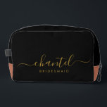 Bridesmaid Modern Gold Script Black Dopp Kit<br><div class="desc">This Bridesmaid accessory bag features a handwritten gold script typography with swashes on a black background. Present your bridesmaids with a toiletry bag for their makeup and small items traditionally presented at the rehearsal dinner,  for use in the early morning before the wedding.</div>