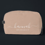 Bridesmaid Modern Minimal Script Cosmetic  Dopp Kit<br><div class="desc">This Bridesmaid accessory bag features a handwritten white script typography with swashes on a tan background. Present your bridesmaids with a toiletry bag for their makeup and small items traditionally presented at the rehearsal dinner,  for use in the early morning before the wedding.</div>