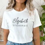 Bridesmaid Modern Minimalist Script Bachelorette T-Shirt<br><div class="desc">Elevate your bachelorette party with our "Bridesmaid Modern Minimalist Script" collection. This exquisite line of products embodies contemporary elegance and timeless style, perfect for celebrating your upcoming nuptials in a modern and sophisticated way. Our minimalist script design places your bridesmaids at the forefront, adding a touch of class to every...</div>