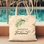 Bridesmaid Palm Leaf Personalized Bridal Party Tote Bag<br><div class="desc">Bridal party gift to personalize for your bridesmaid - or anyone in your wedding party. Bridesmaid is lettered in swirly handwritten calligraphy and, you can easily switch this to a different role, by entering the design tool. The design features a watercolor tropical palm leaf which is also used in the...</div>