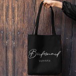 Bridesmaid Personalized Chic Minimalist Wedding Tote Bag<br><div class="desc">This chic,  simple bridesmaid black tote bag features your name underneath elegant white typography. Customize these elegant,  modern bridal party gifts for your wedding or bachelorette party.</div>