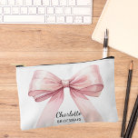 Bridesmaid pink bow elegant name accessory pouch<br><div class="desc">White background. Decorated with a large pink bow.
Personalize and add your bridesmaid's name.</div>