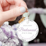 Bridesmaid Wedding Gift Lavender Purple & Grey Keychain<br><div class="desc">These keychains are designed to give as favours to bridesmaids in your wedding party. Designed to coordinate with our Purple & Grey Elegant Wedding Suite, they feature a simple yet elegant design with a white background, lavender & Grey text, and a silver faux foil floral border. Perfect way to thank...</div>
