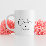 Bridesmaid Wedding Simple Modern Script Name Coffee Mug<br><div class="desc">Bridesmaid Wedding Simple Modern Calligraphy Script Personalized Name Coffee Mug features your bridesmaid's name in elegant black calligraphy script accented with a simple love heart with the addition of your custom text such as the date and bridemaid. Text and heart colours can be adjusted in the editor to suit your...</div>