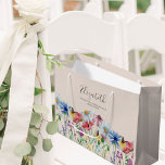Bridesmaid Wildflower Charm Thank You Large Gift Bag<br><div class="desc">Personalized wildflower wedding gift bag for your bridesmaid. This pretty floral design has watercolor wild flowers in pink lilac orange and yellow with elegant handwritten typography. The template is set up for you to also add the bridesmaid's name, the bride and groom's name and wedding date. You can also edit...</div>