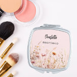 Bridesmaid wildflowers pink beige cream compact mirror<br><div class="desc">A blush pink background. Decorated with wildflowers in beige,  cream and pink.  Personalize and add your bridesmaid's name.   Black handwritten style script.</div>