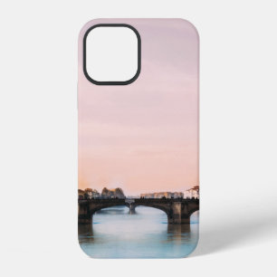 BRIDGE CROSSING RIVER IN TOWN UNDER CLOUDY SKY iPhone 12 CASE