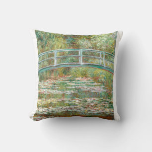 Bridge over a Pond of Water Lilies by Claude Monet Throw Pillow