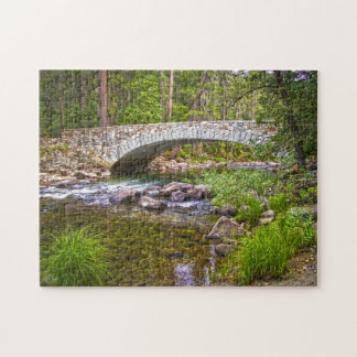 Bridge over sparkling stream jigsaw puzzle