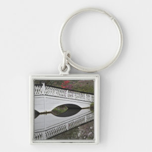 Bridge reflecting on pond, Magnolia Keychain
