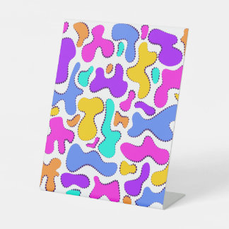 Bright acid liquid shapes pedestal sign
