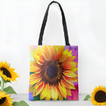 Bright and Colourful Sunflower Tote Bag<br><div class="desc">Make a vibrant botanical statement with our Bright Colourful Sunflower Tote Bag. This trendy All-Over-Print Tote Bag features a captivating painting of a sunflower in all its vibrant glory, making it a perfect accessory for nature enthusiasts. Add a personal touch to your bag with a custom name discreetly printed in...</div>