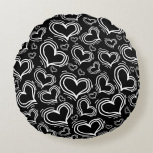 BRIGHT BLACK WITH WHITE HEARTS AND FLOWERS ROUND PILLOW