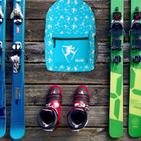 Bright Blue Skiers and Ski Tricks Winter Themed