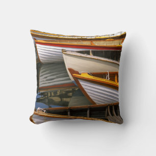 Bright coloured boats at the Wooden Boat Centre Throw Pillow