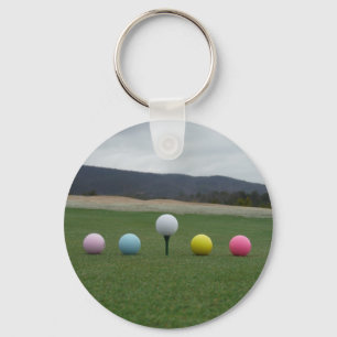 bright coloured Golf Balls on a mountain Keychain