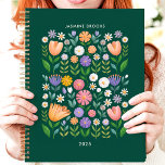 Bright Folk Art Floral Custom Name Planner<br><div class="desc">This cheerful design features a vibrant folk art-inspired floral pattern with colourful blooms in shades of pink, purple, orange, and white against a deep green background. The personalized name and year add a unique touch, making it perfect for students, professionals, or anyone who loves playful and artistic designs. Ideal for...</div>