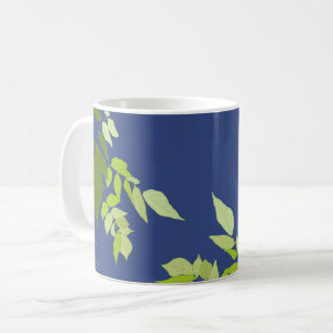 Bright Leaves on Blue Coffee Mug